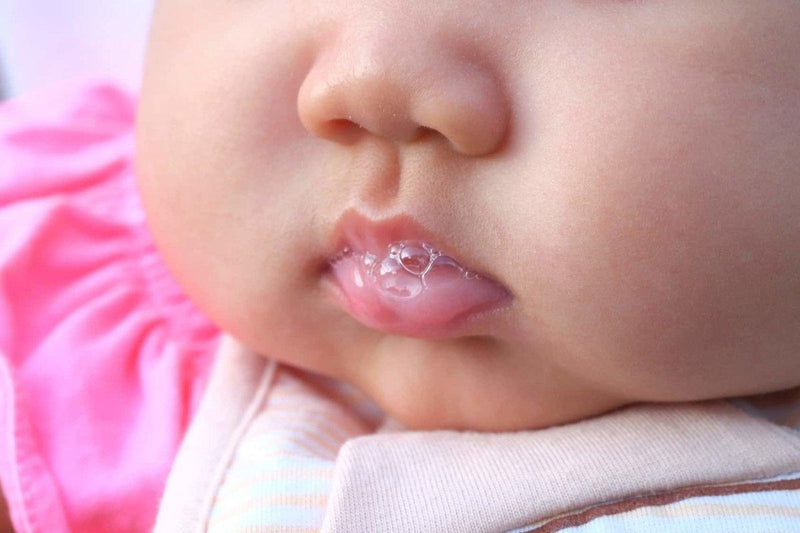 What to Do When Your Baby is Spitting Up More than Normal - Formuland