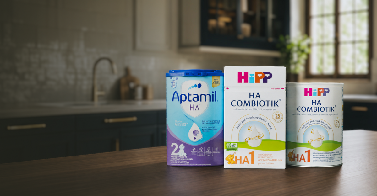 Aptamil HA and HiPP HA Combiotik hypoallergenic formula on a kitchen counter