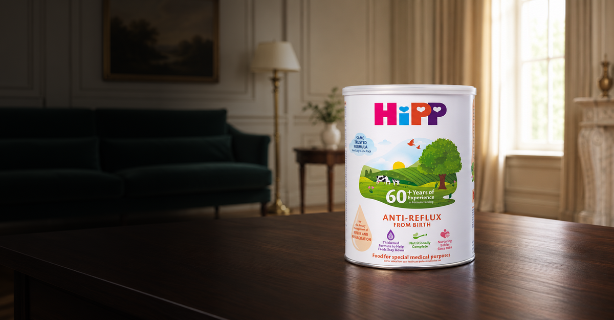 HiPP Anti-Reflux formula tin on a wooden table