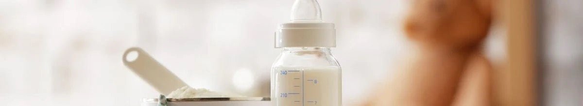 HiPP HA formula bottle with baby