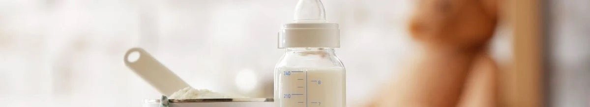 HiPP HA formula bottle with baby
